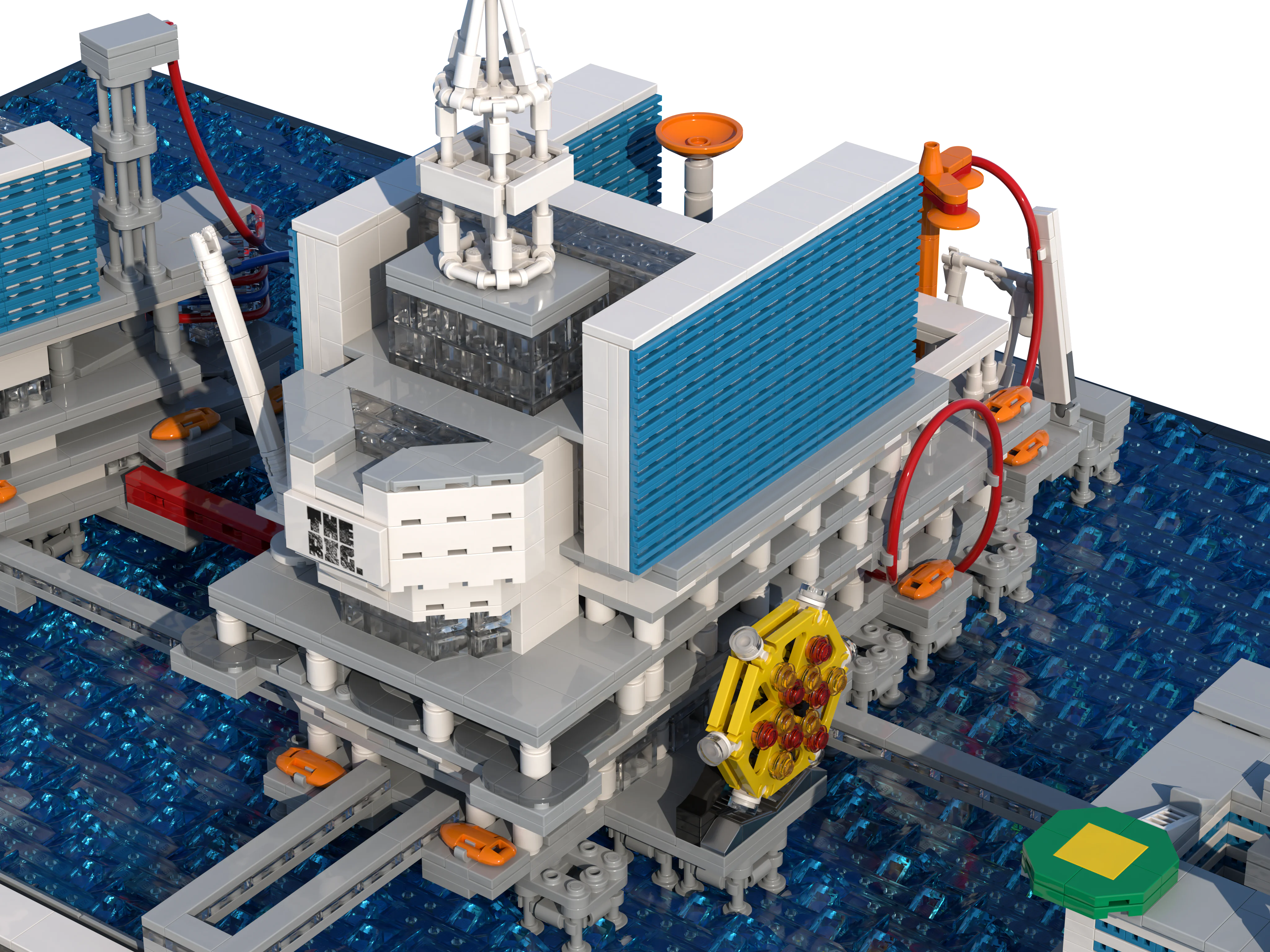 The Derrick platform of the LEGO model, with its hotel tower, “The Rig” sign, drilling derrick and Ferris wheel